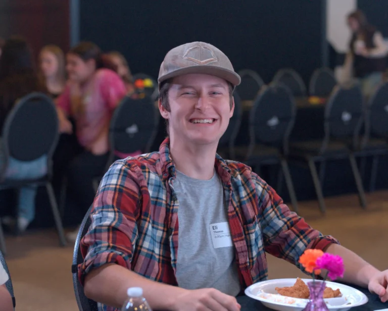 ngStudent smiling during activity.